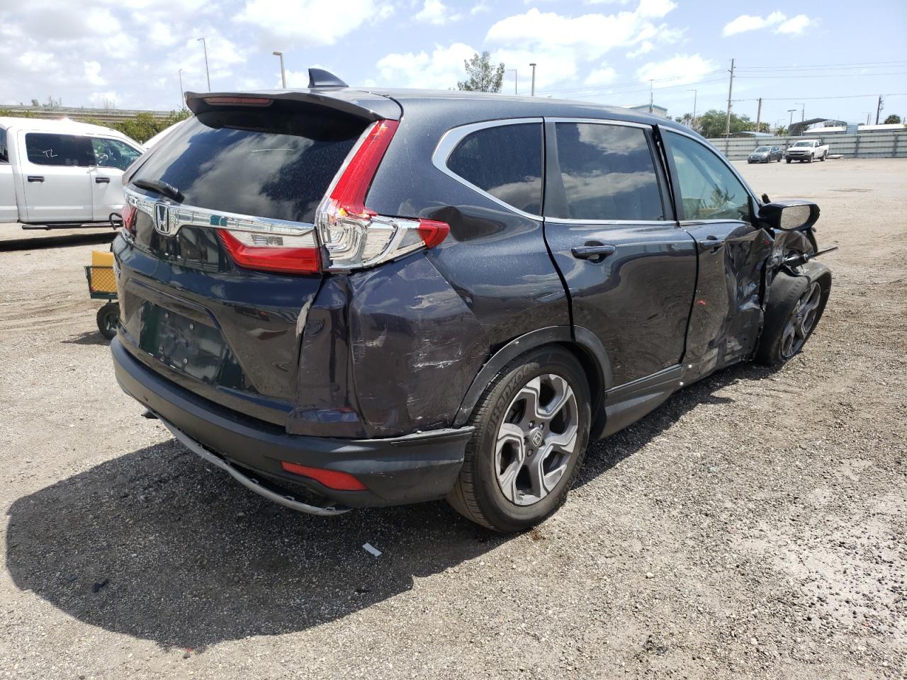 Photo 4 from auction – 2017 HONDA CR-V EX with VIN 7FARW1H59HE041434