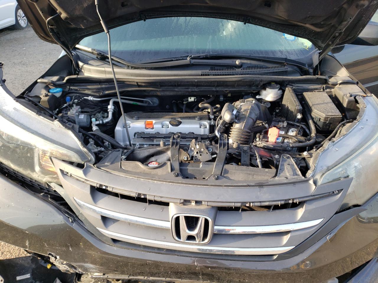 Photo 7 from auction – 2013 HONDA CR-V LX with VIN 5J6RM3H35DL008508