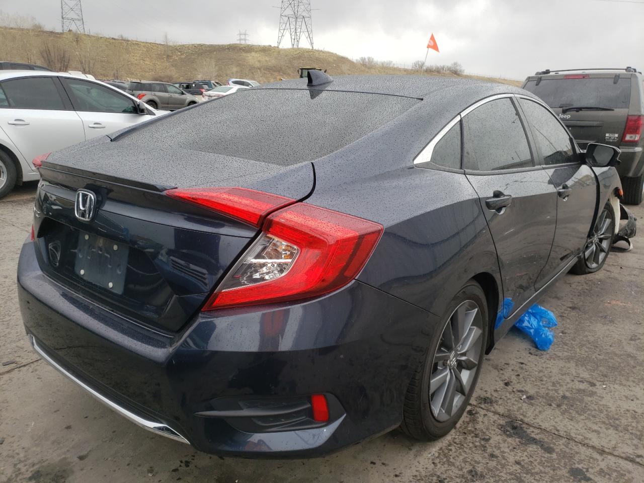 Photo 4 from auction – 2019 HONDA CIVIC EX with VIN JHMFC1F32KX012572