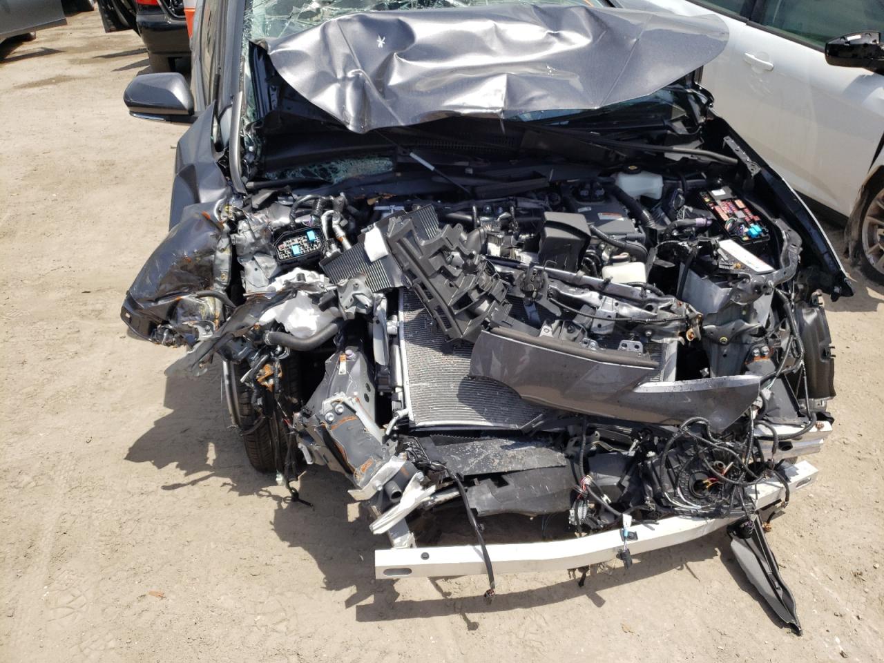 Photo 9 from auction – 2021 TOYOTA PRIUS SPEC with VIN JTDKAMFUXM3147244