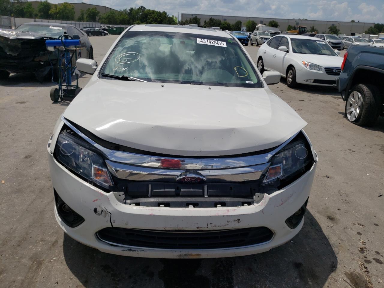 Photo 9 from auction – 2011 FORD FUSION SE with VIN 3FAHP0HA5BR344606