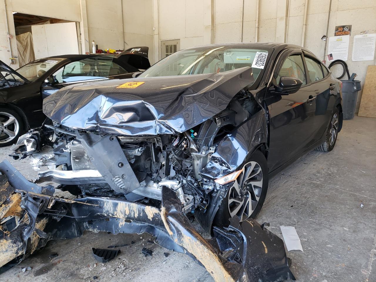 Photo 2 from auction – 2017 HONDA CIVIC EX with VIN 19XFC2F72HE036311