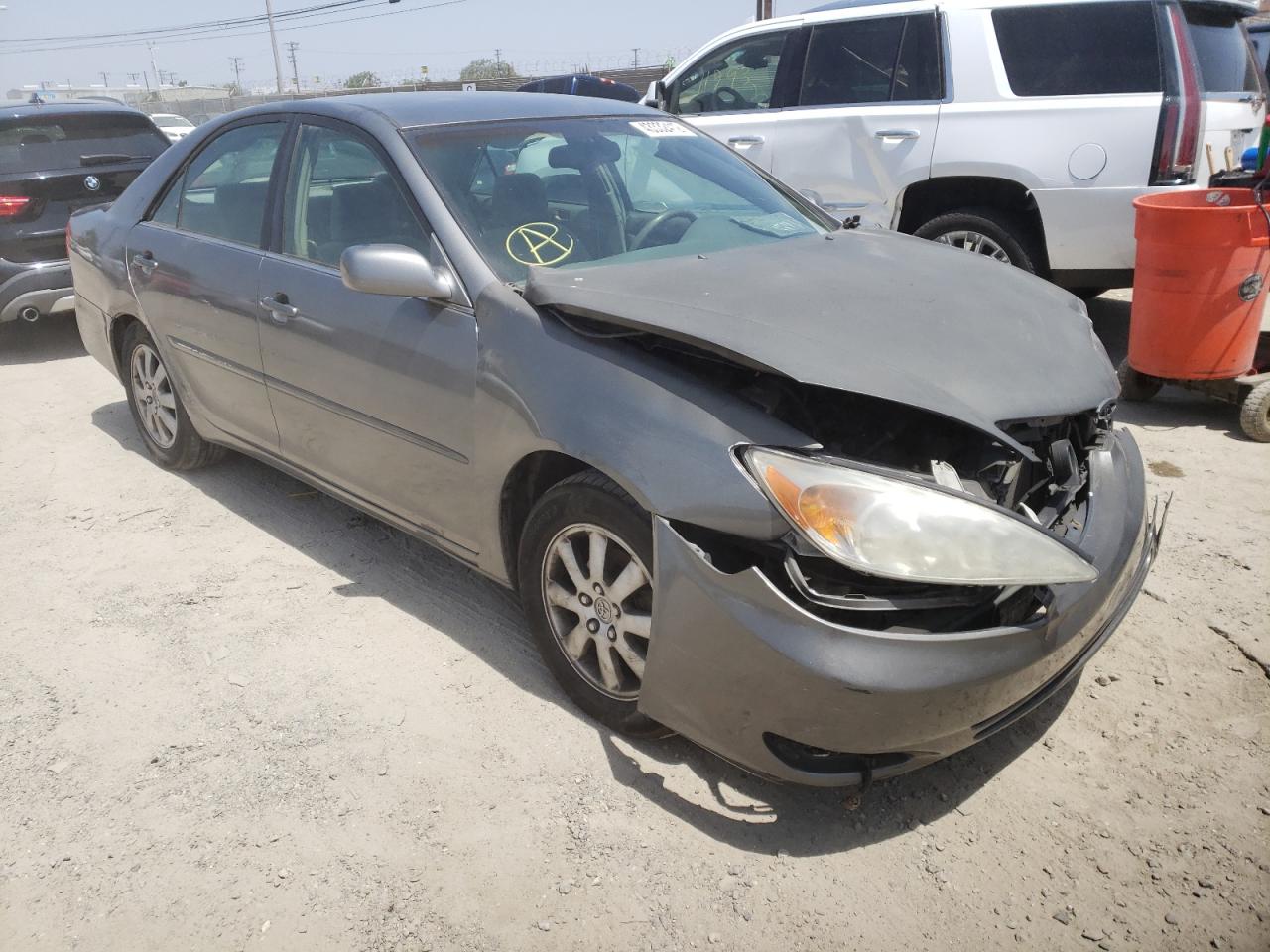 TOYOTA CAMRY LE 2003 with VIN 4T1BE32K33U743836 - Photo from auction