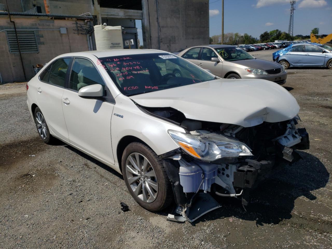 TOYOTA CAMRY HYBR 2015 with VIN 4T1BD1FK7FU145481 - Photo from auction