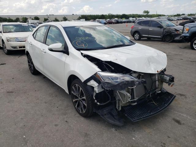 TOYOTA COROLLA 2018 with VIN 5YFBURHE3JP801966 - Photo from auction