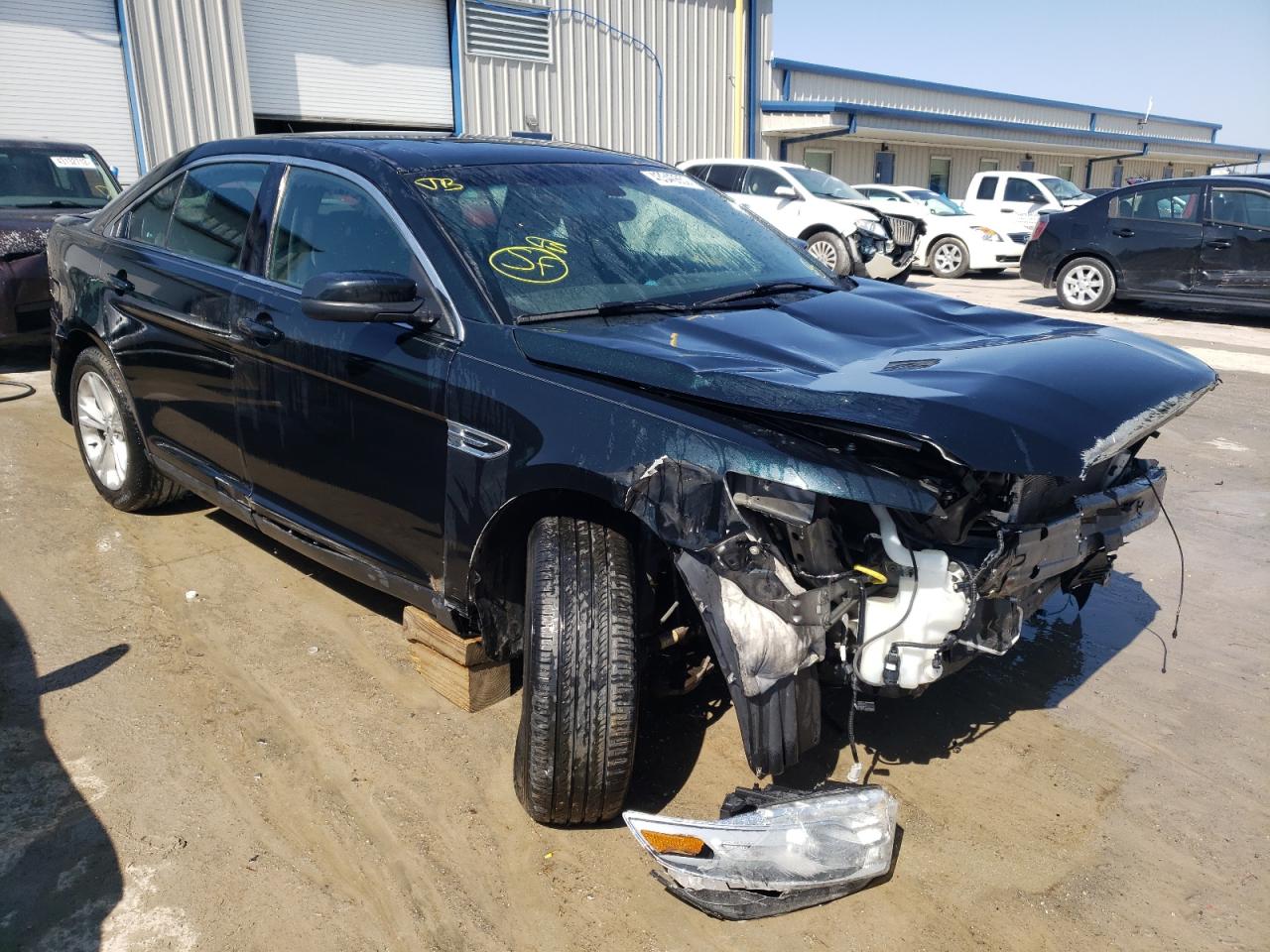 FORD TAURUS SEL 2014 with VIN 1FAHP2E80EG119549 - Photo from auction