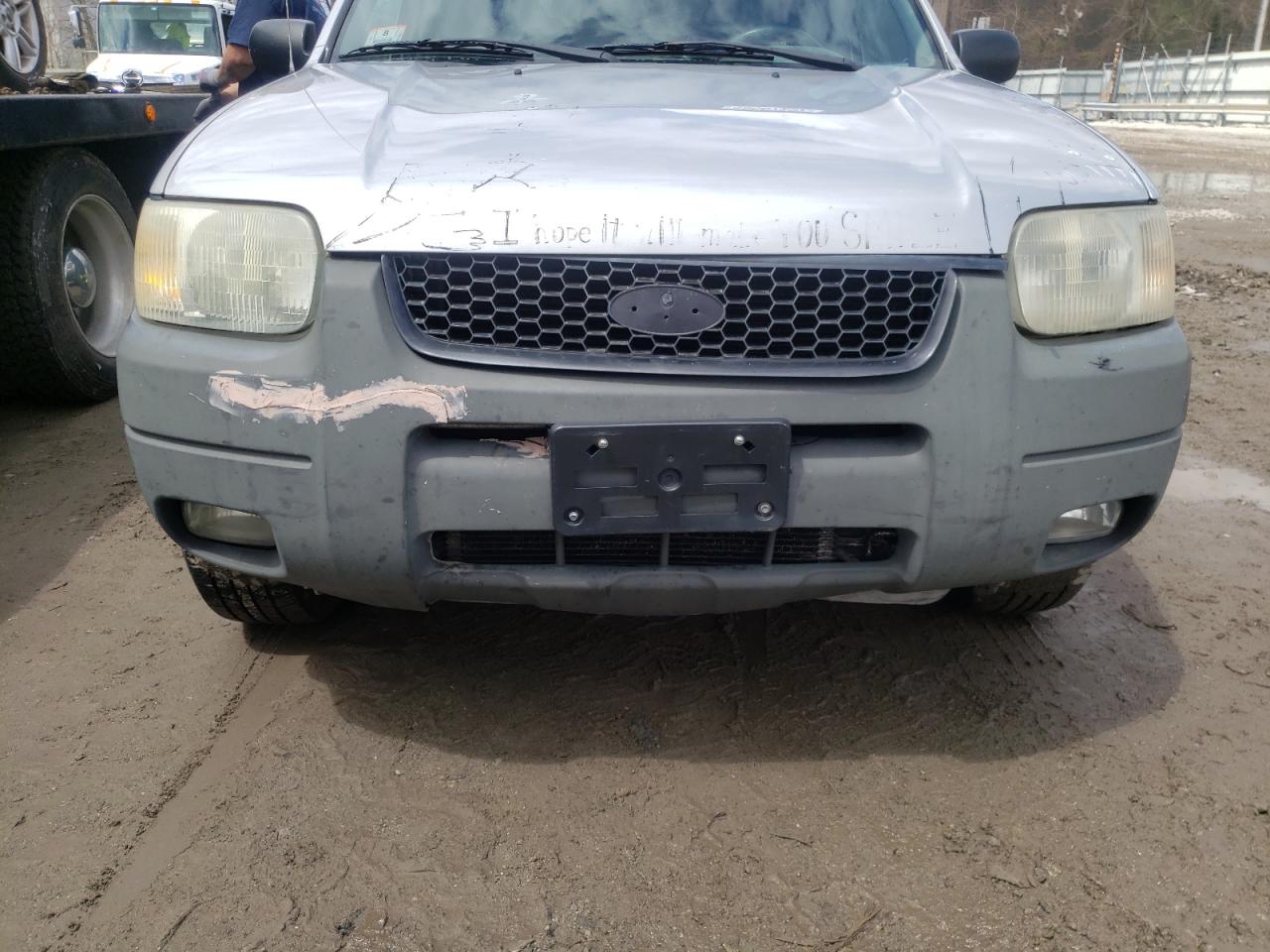 Photo 9 from auction – 2002 FORD ESCAPE XLT with VIN 1FMYU04162KD24356