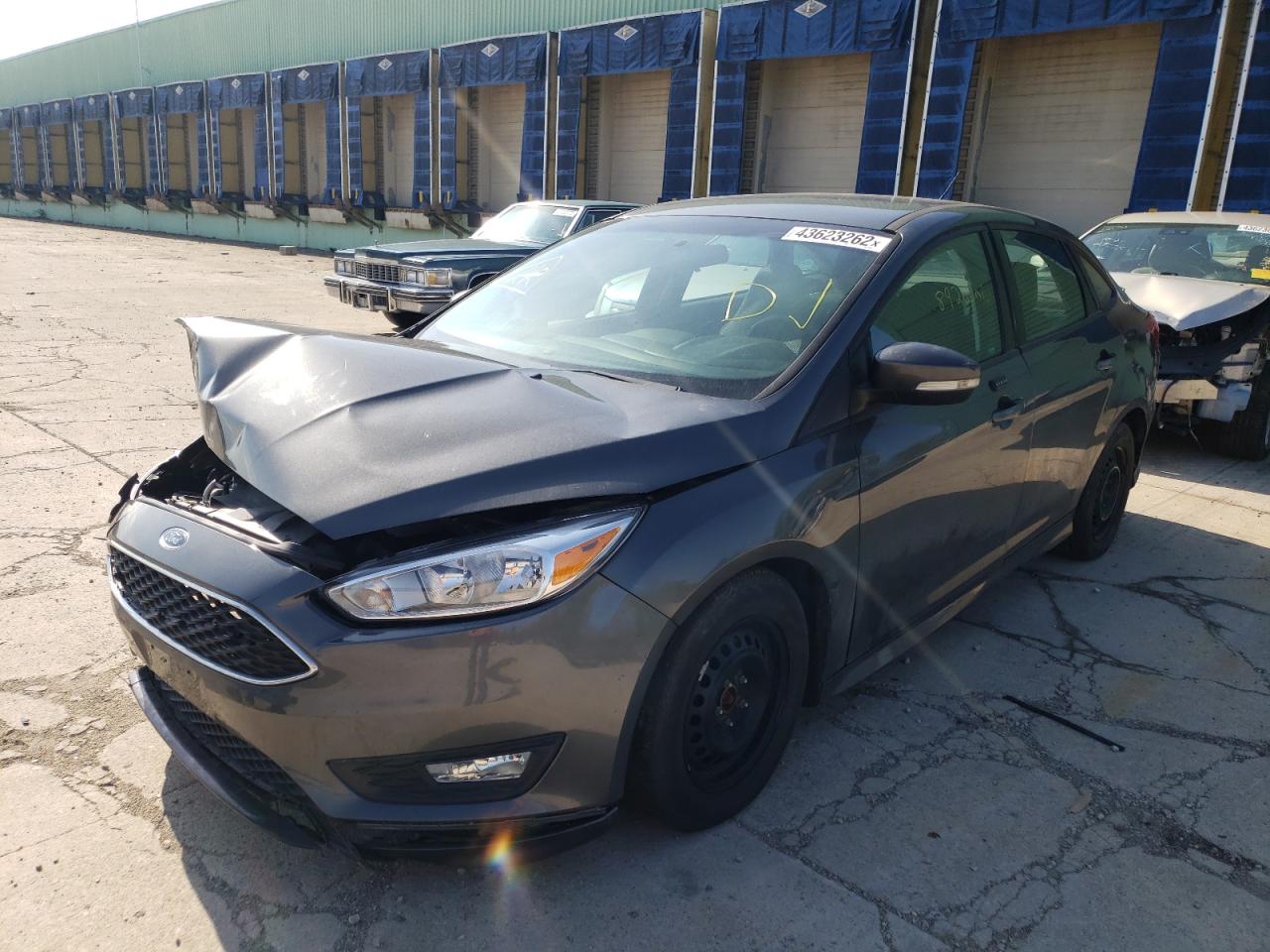 Photo 2 from auction – 2016 FORD FOCUS SE with VIN 1FADP3F28GL230309