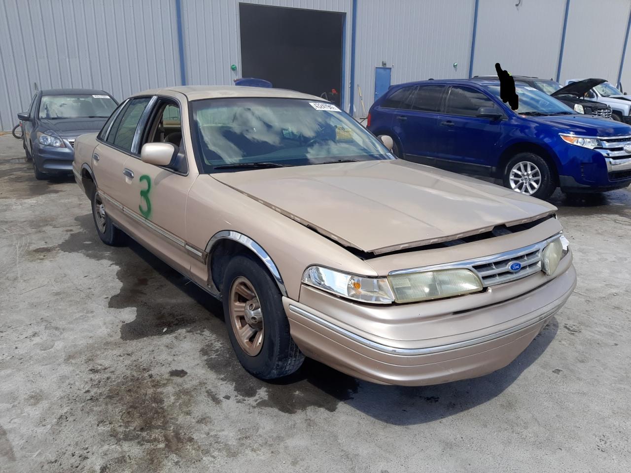 FORD CROWN VICT 1996 with VIN 2FALP7368TX100182 - Photo from auction