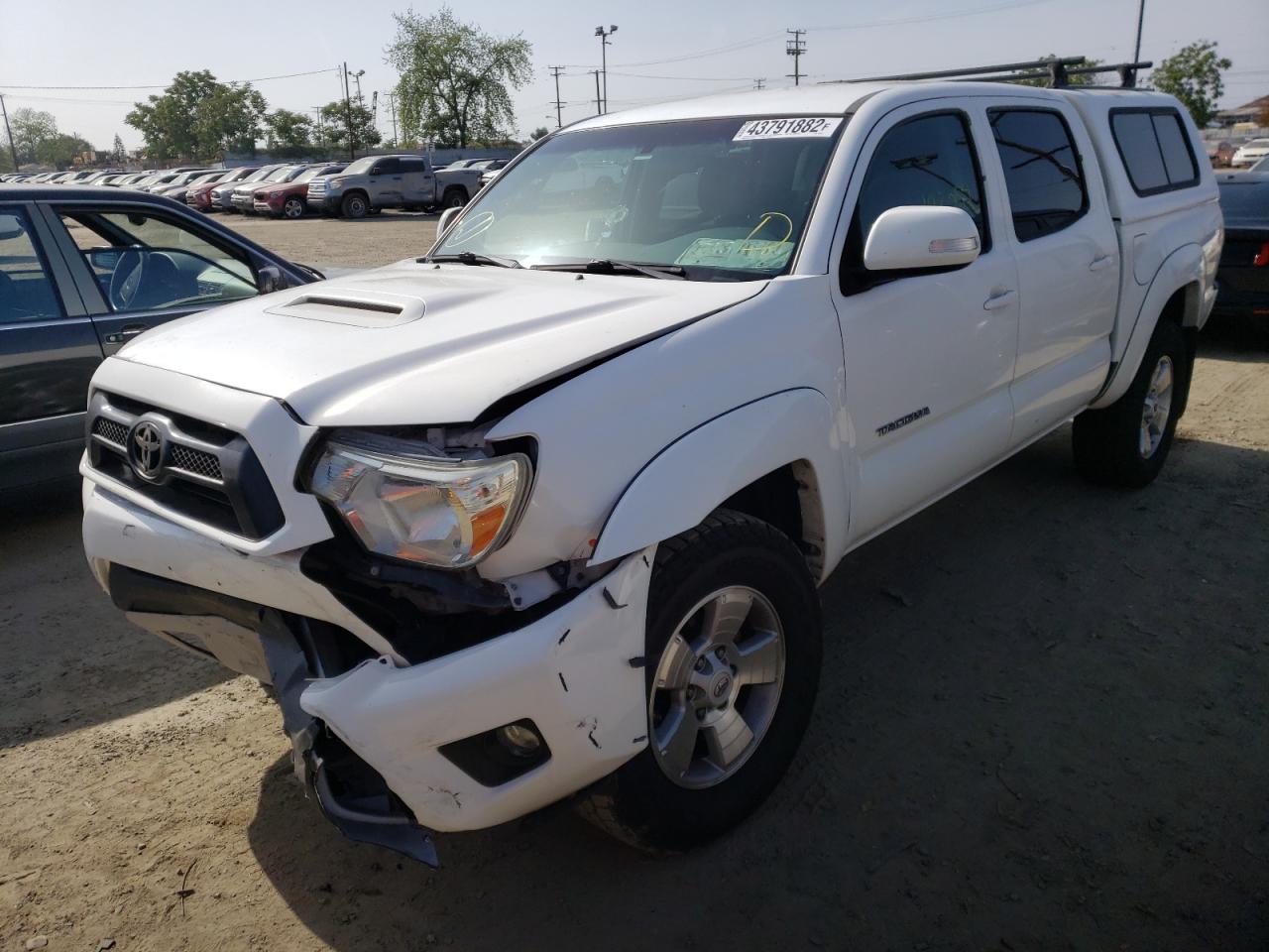 Photo 2 from auction – 2014 TOYOTA TACOMA DOU with VIN 3TMLU4EN5EM159579
