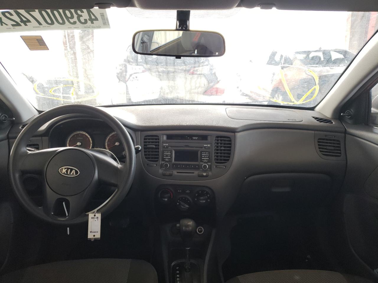 Photo 9 from auction – 2011 KIA RIO BASE with VIN KNADH4A30B6732121