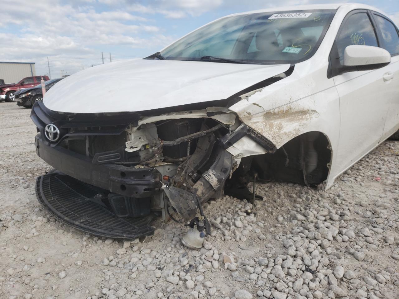Photo 9 from auction – 2014 TOYOTA COROLLA L with VIN 5YFBURHE1EP094601