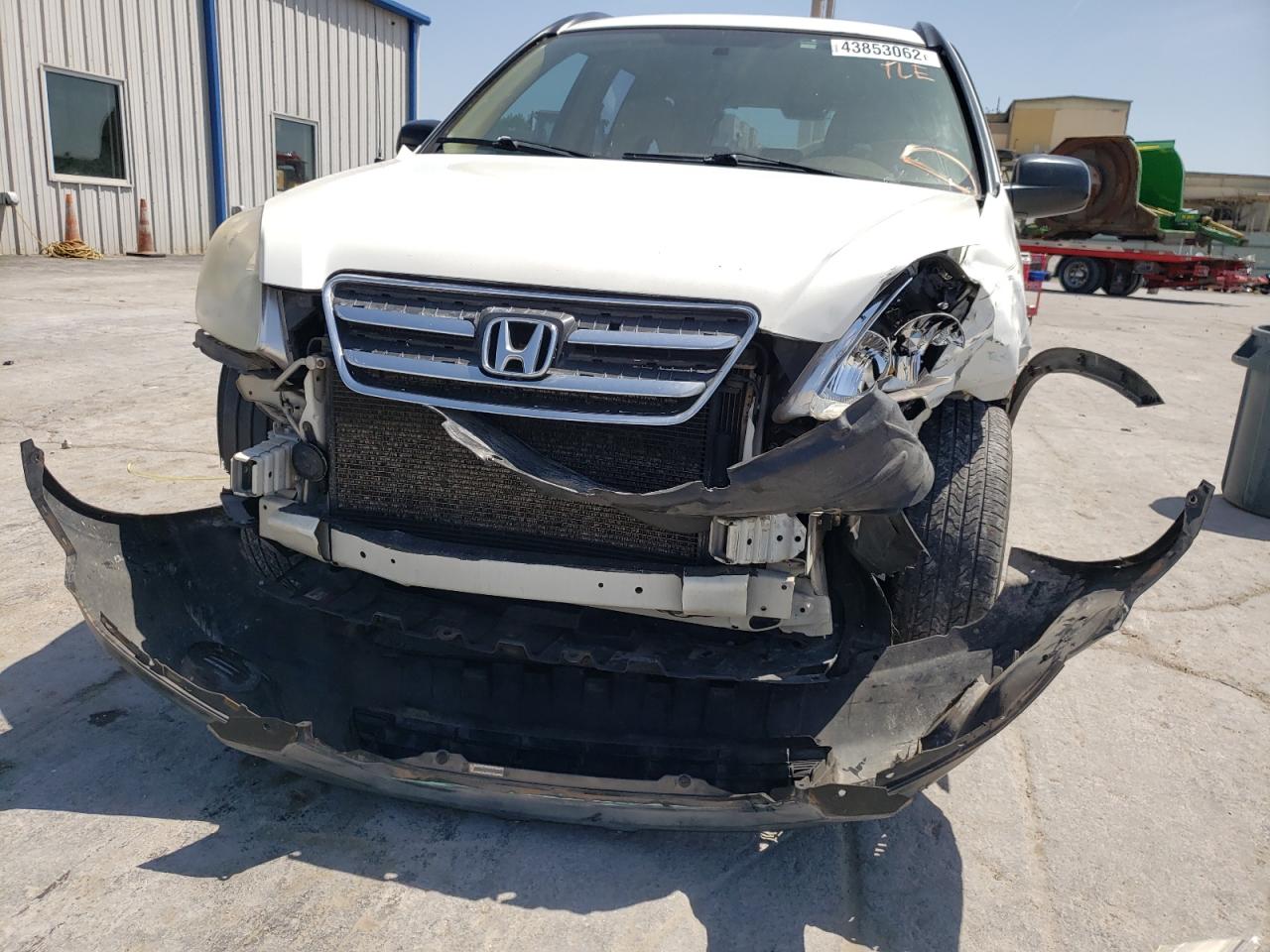 Photo 9 from auction – 2005 HONDA CR-V LX with VIN JHLRD68555C002124