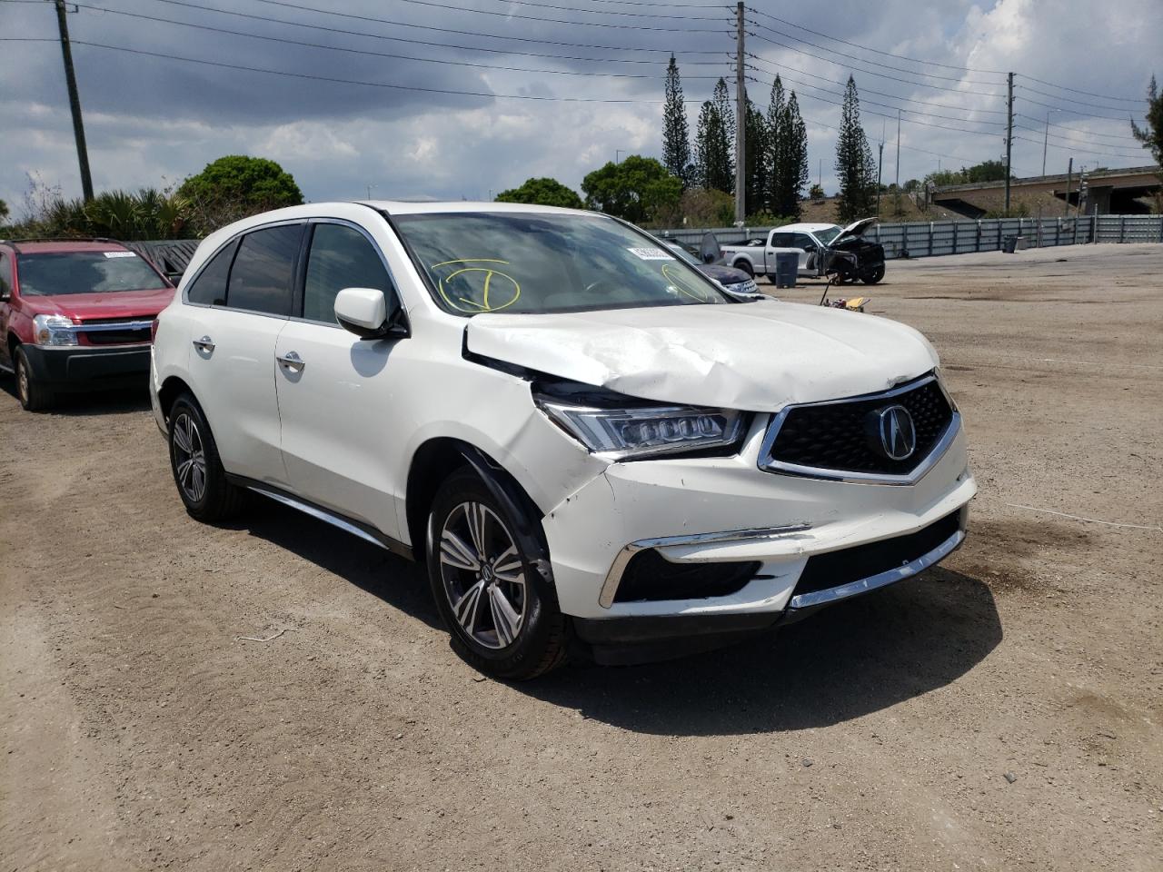 ACURA MDX 2018 with VIN 5J8YD3H39JL001074 - Photo from auction