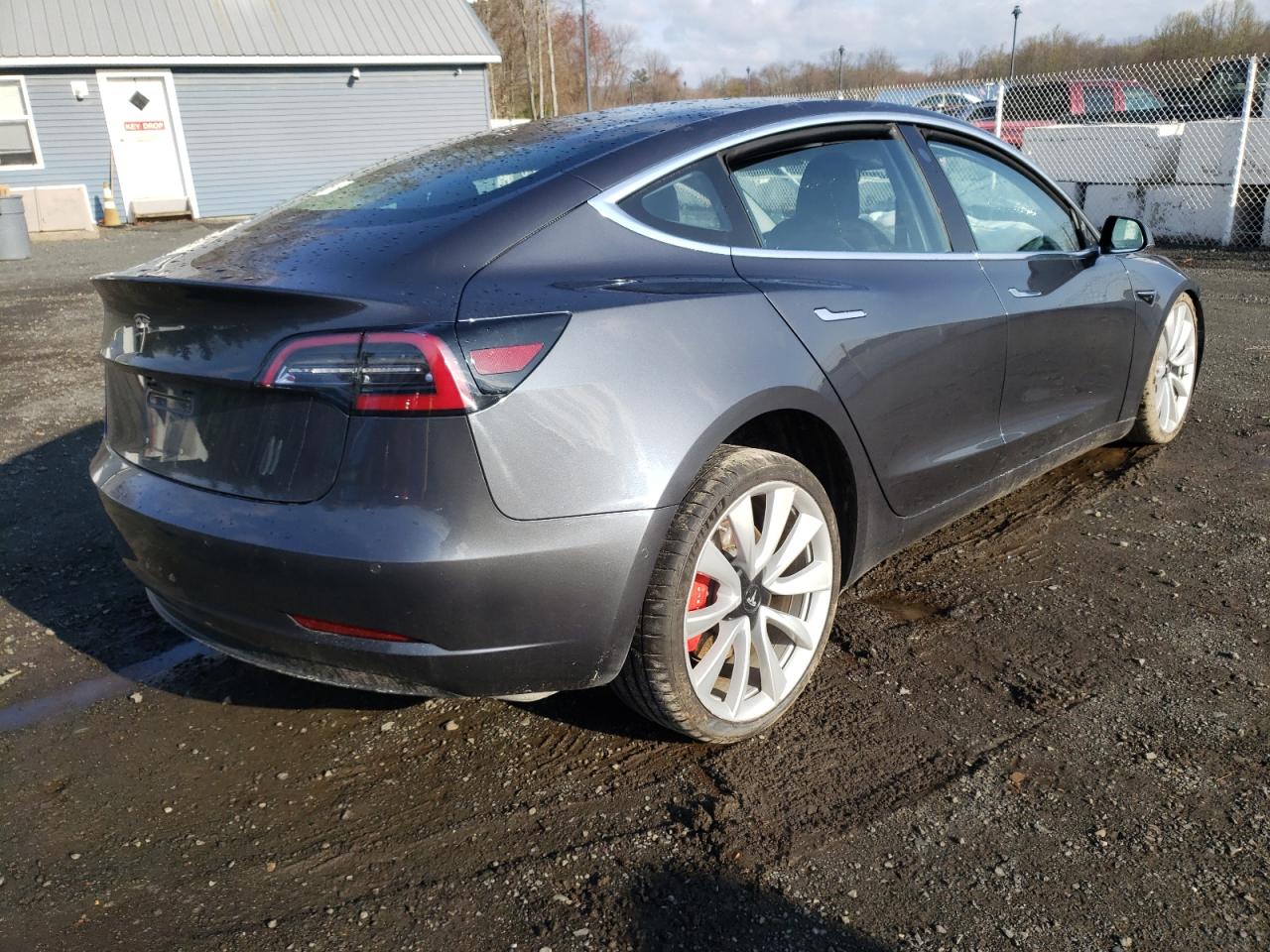 Photo 4 from auction – 2018 TESLA MODEL 3 with VIN 5YJ3E1EB8JF083226