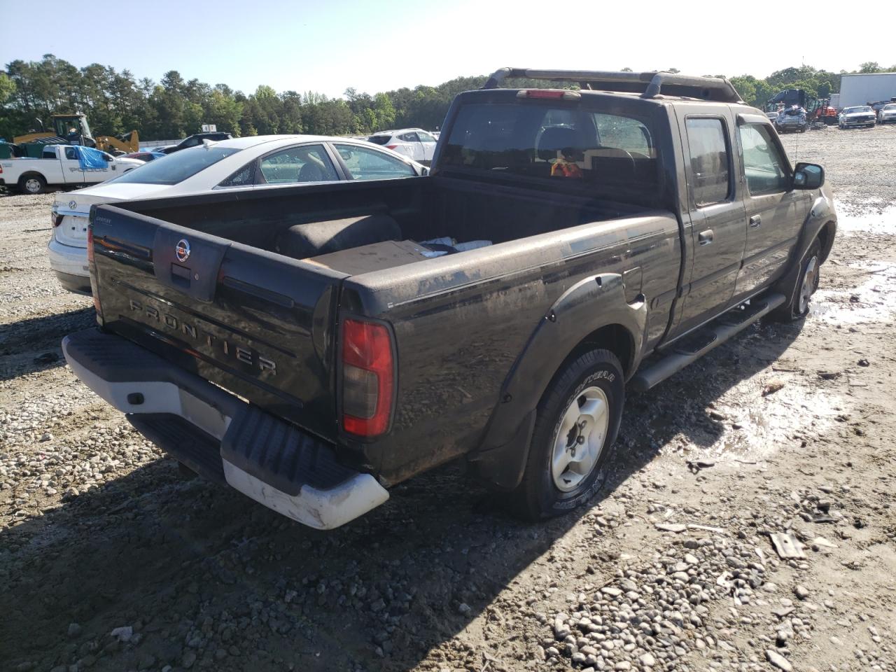 Photo 4 from auction – 2002 NISSAN FRONTIER C with VIN 1N6ED29X52C319611