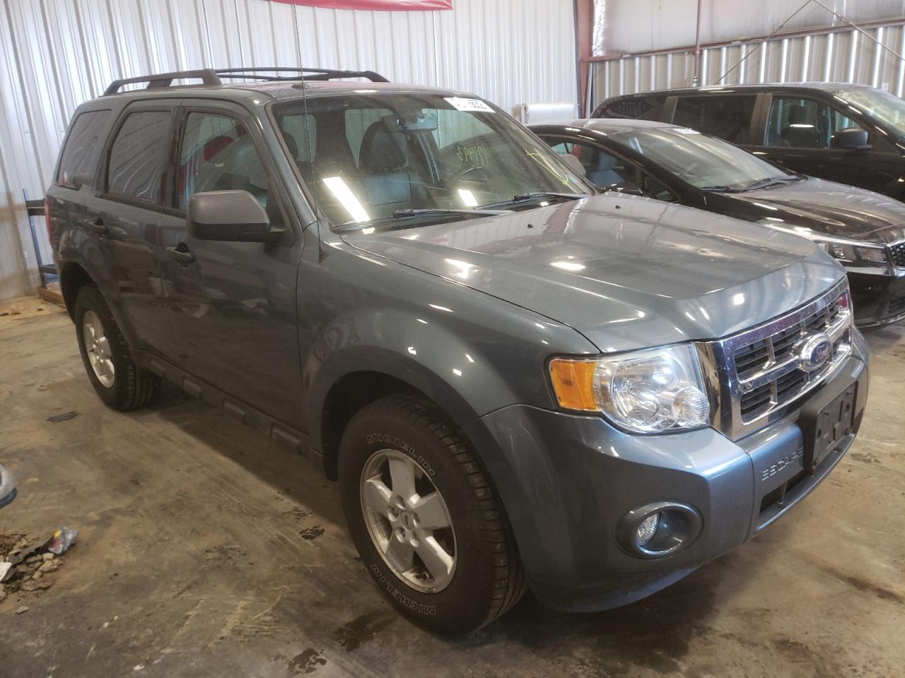 FORD ESCAPE XLT 2011 with VIN 1FMCU9DG0BKA27702 - Photo from auction