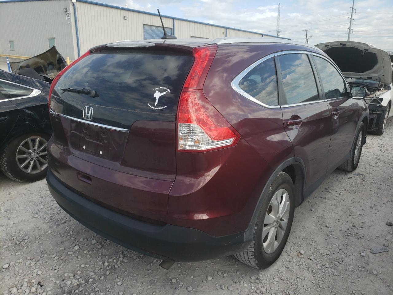 Photo 4 from auction – 2014 HONDA CR-V EXL with VIN 5J6RM3H79EL025882