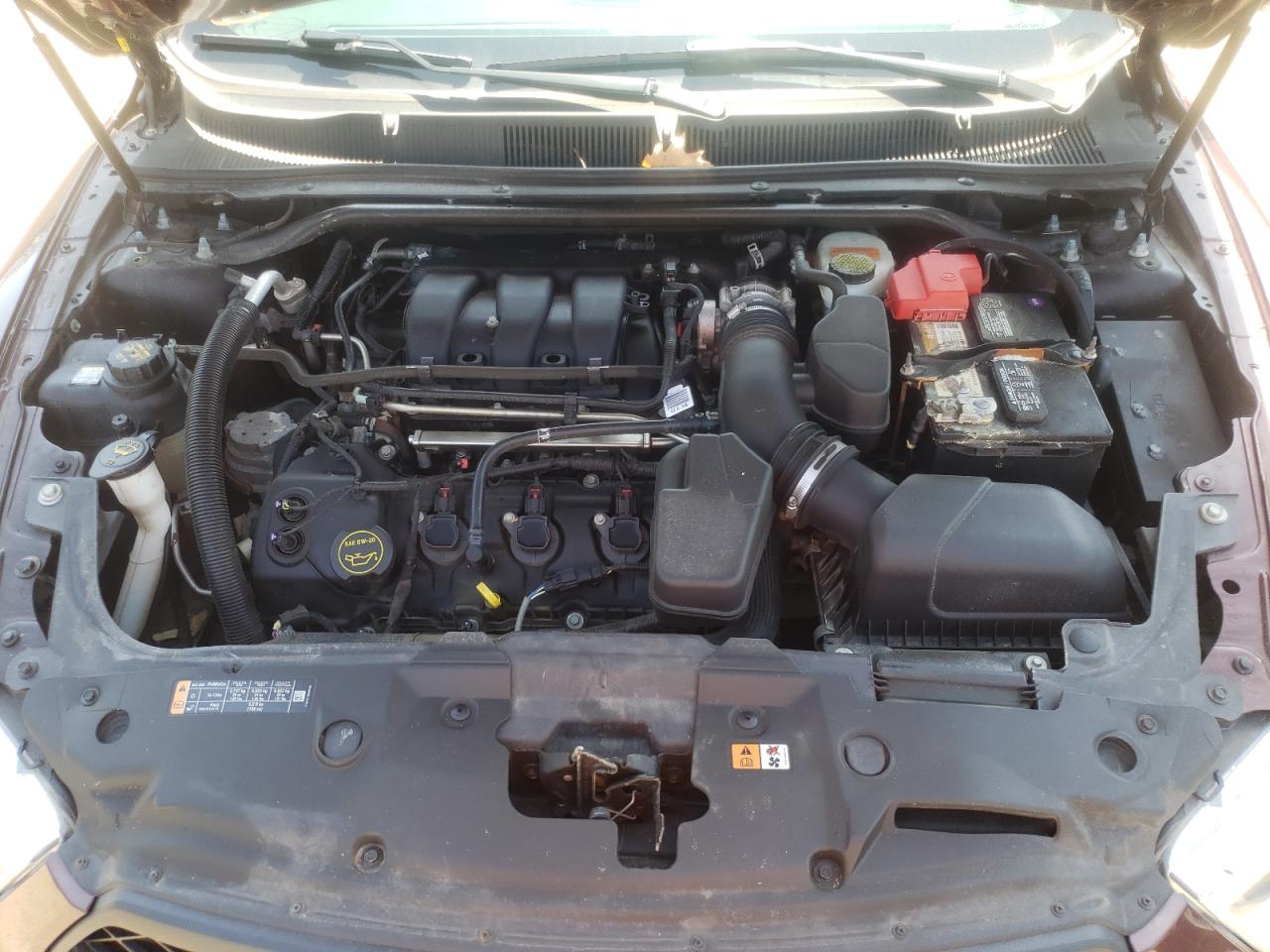 Photo 7 from auction – 2016 FORD TAURUS POL with VIN 1FAHP2MK2GG129807