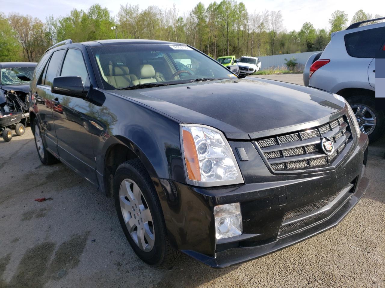 CADILLAC SRX 2009 with VIN 1GYEE637590139874 - Photo from auction