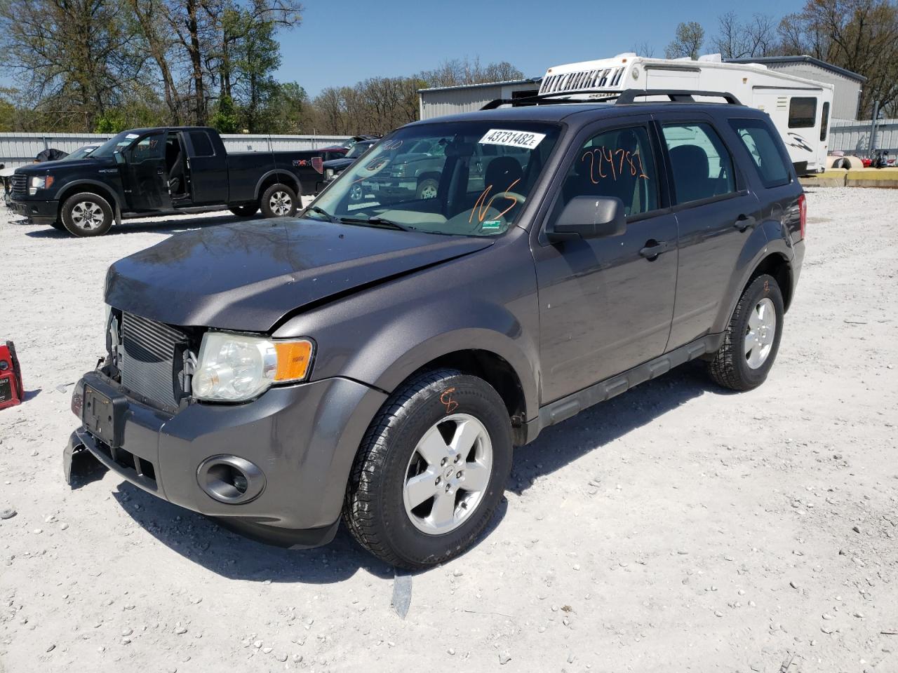 Photo 2 from auction – 2010 FORD ESCAPE with VIN 1FMCU0C71AKB76860