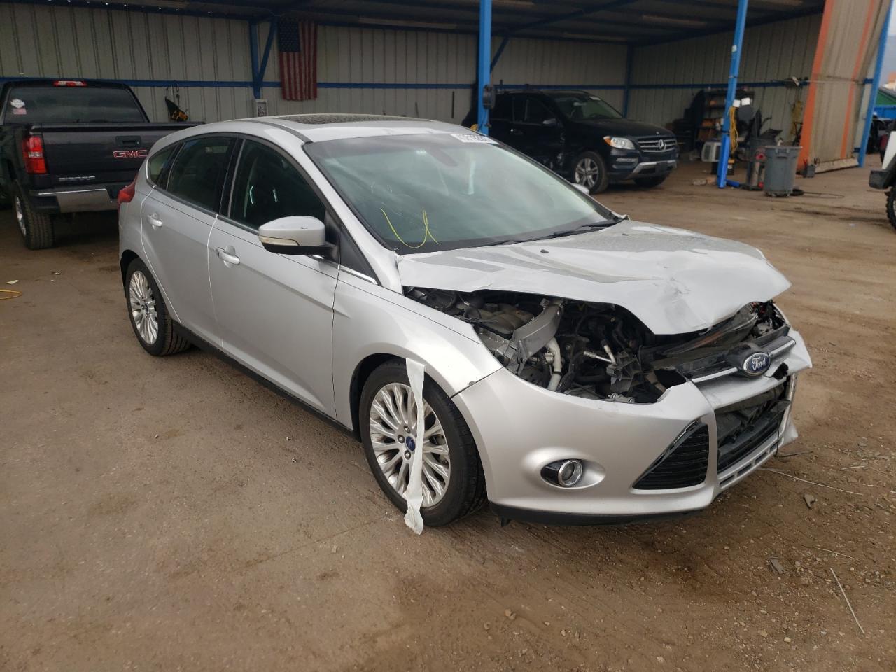 FORD FOCUS TITA 2012 с VIN 1FAHP3N25CL310924 - Снимка от търг