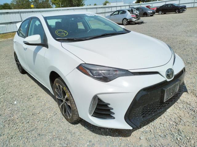 TOYOTA COROLLA L 2018 with VIN 5YFBURHE3JP797627 - Photo from auction