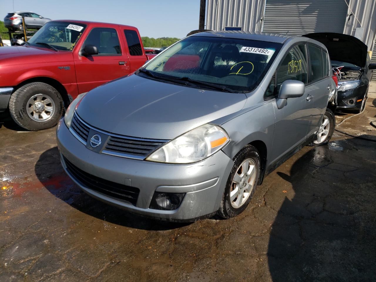 Photo 2 from auction – 2009 NISSAN VERSA S with VIN 3N1BC13E19L393250