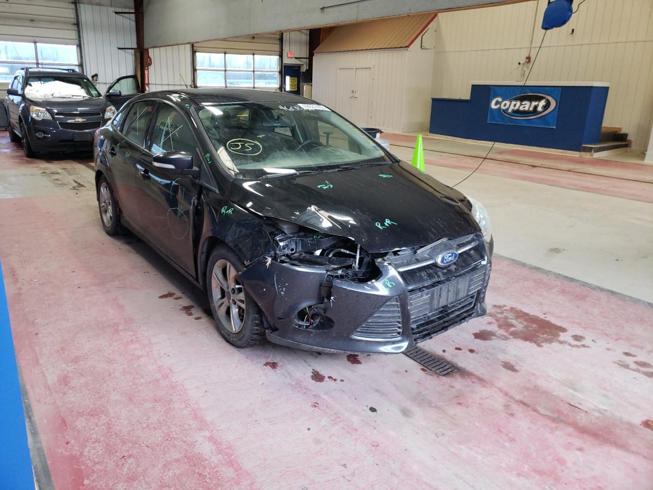 FORD FOCUS SE 2014 with VIN 1FADP3F29EL136419 - Photo from auction