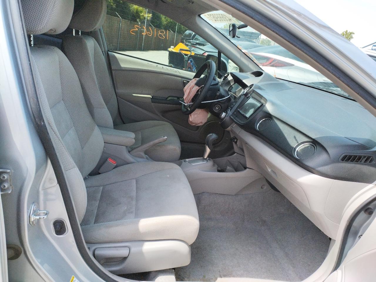 Photo 5 from auction – 2011 HONDA INSIGHT LX with VIN JHMZE2H59BS009516
