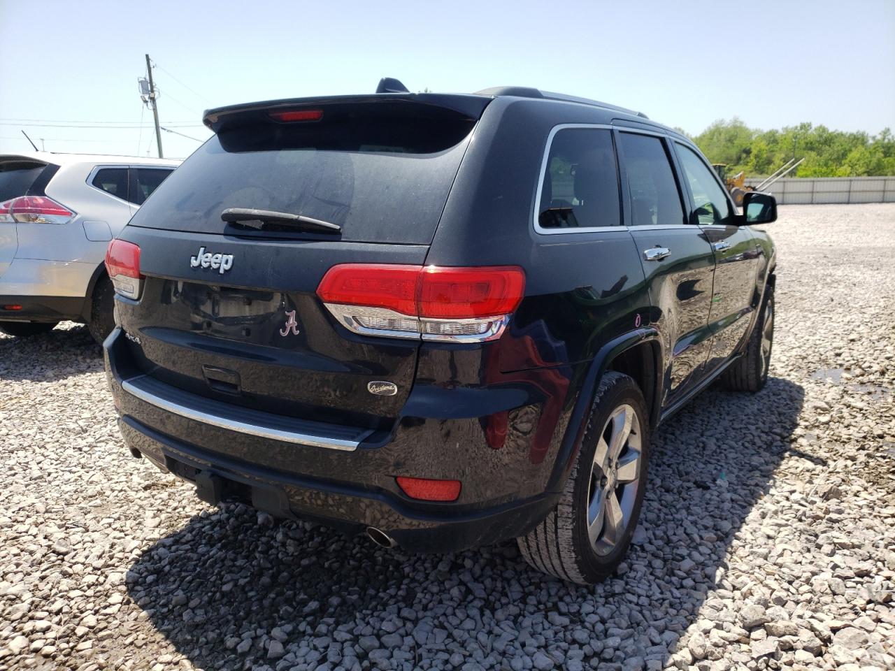 Photo 4 from auction – 2014 JEEP GRAND CHER with VIN 1C4RJFCG4EC119997