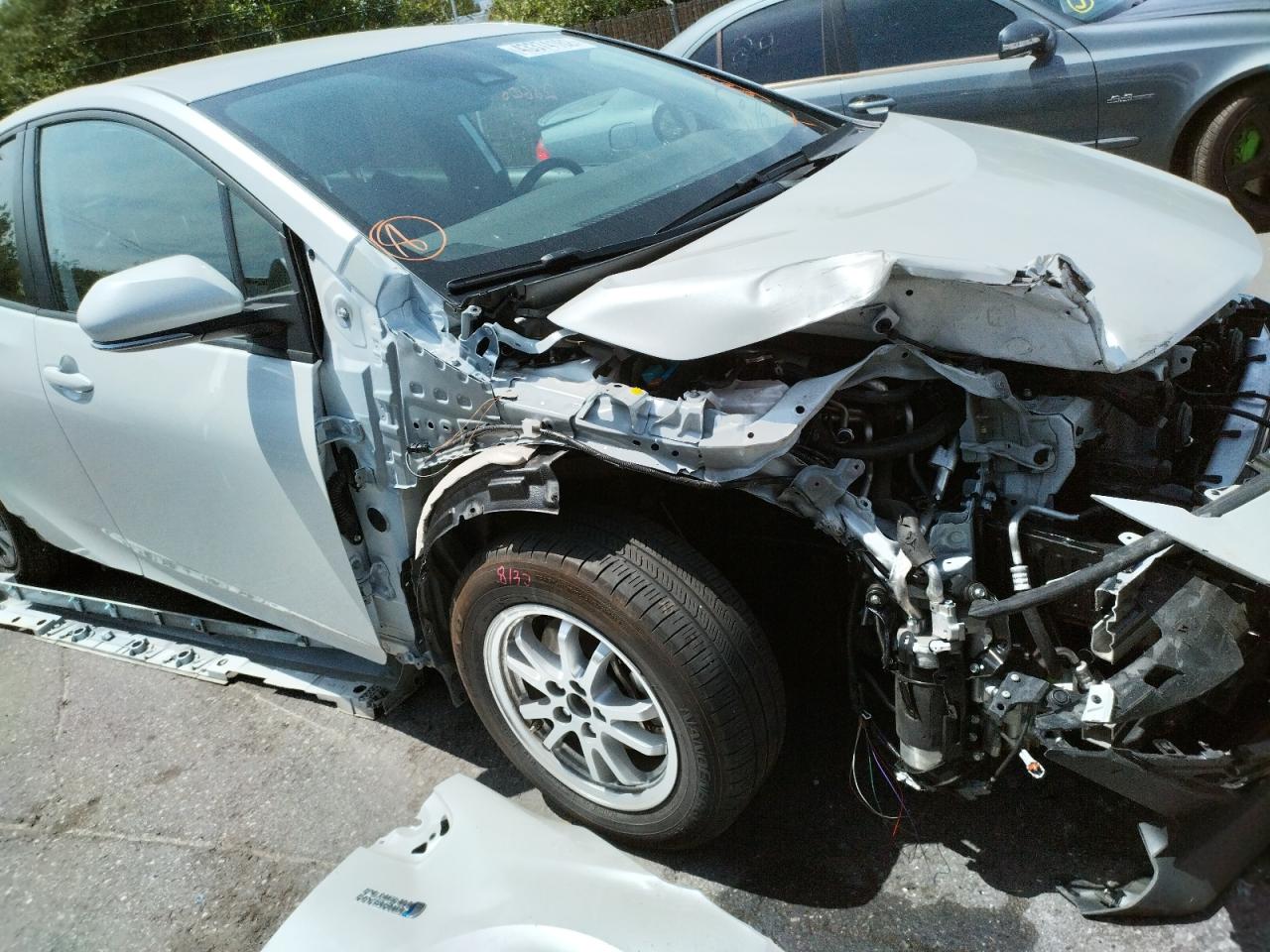 Photo 9 from auction – 2021 TOYOTA PRIUS PRIM with VIN JTDKAMFP9M3177670