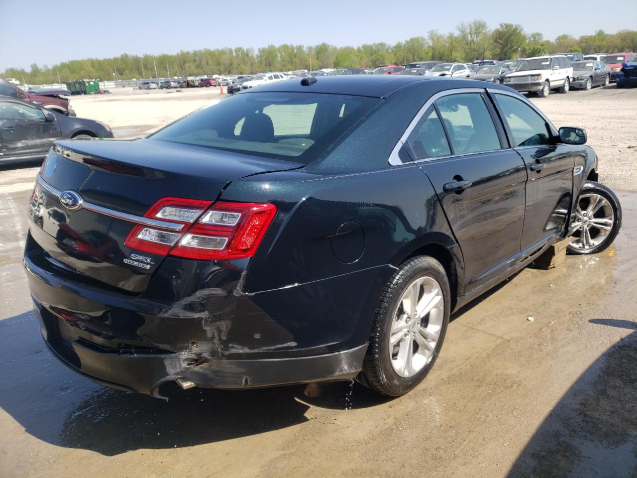 Photo 4 from auction – 2014 FORD TAURUS SEL with VIN 1FAHP2E80EG119549