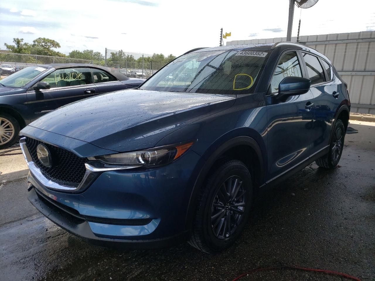 Photo 2 from auction – 2021 MAZDA CX-5 TOURI with VIN JM3KFACM9M1354117