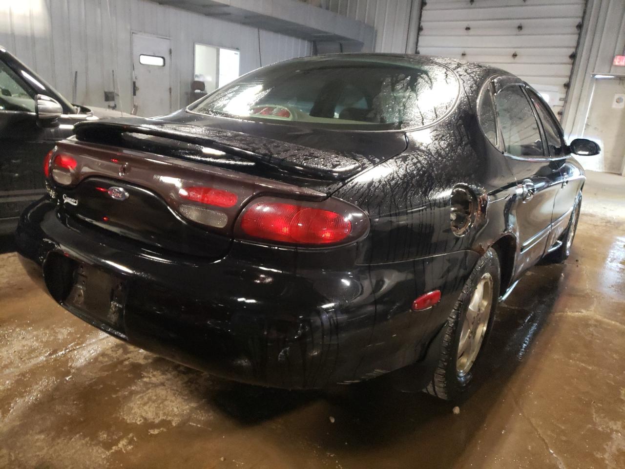 Photo 4 from auction – 1999 FORD TAURUS SE with VIN 1FAFP53S7XG248866