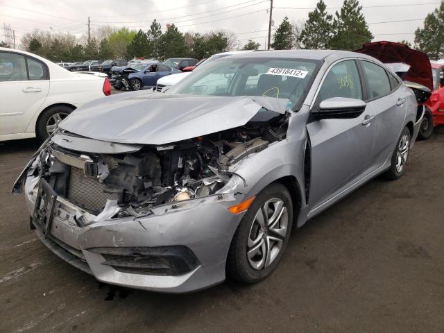 Photo 2 from auction – 2018 HONDA CIVIC LX with VIN 19XFC2E52JE001564
