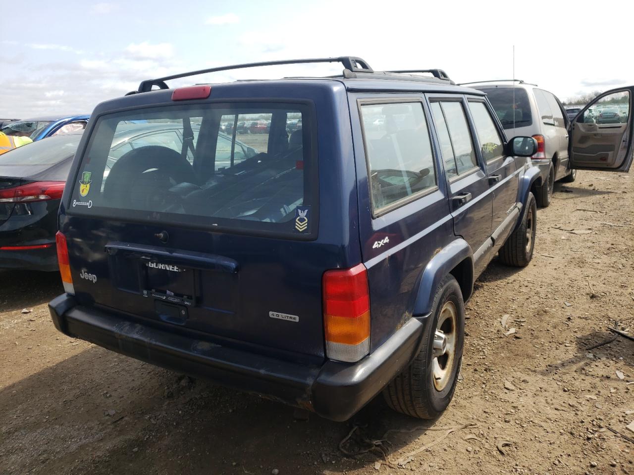 Photo 4 from auction – 2001 JEEP CHEROKEE S with VIN 1J4FF48S21L558240