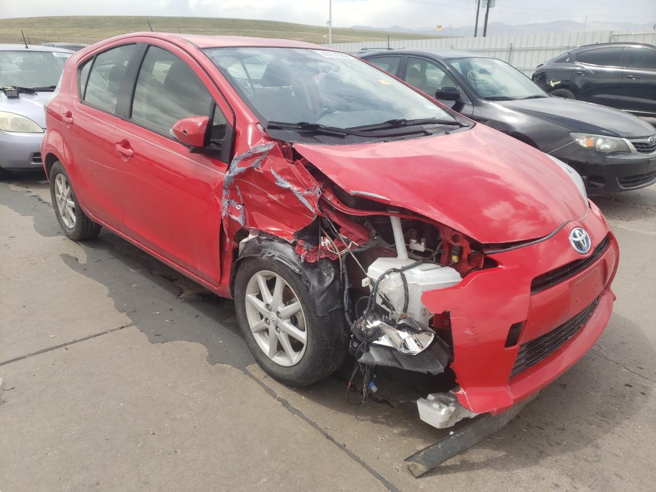 TOYOTA PRIUS C 2014 with VIN JTDKDTB33E1063150 - Photo from auction