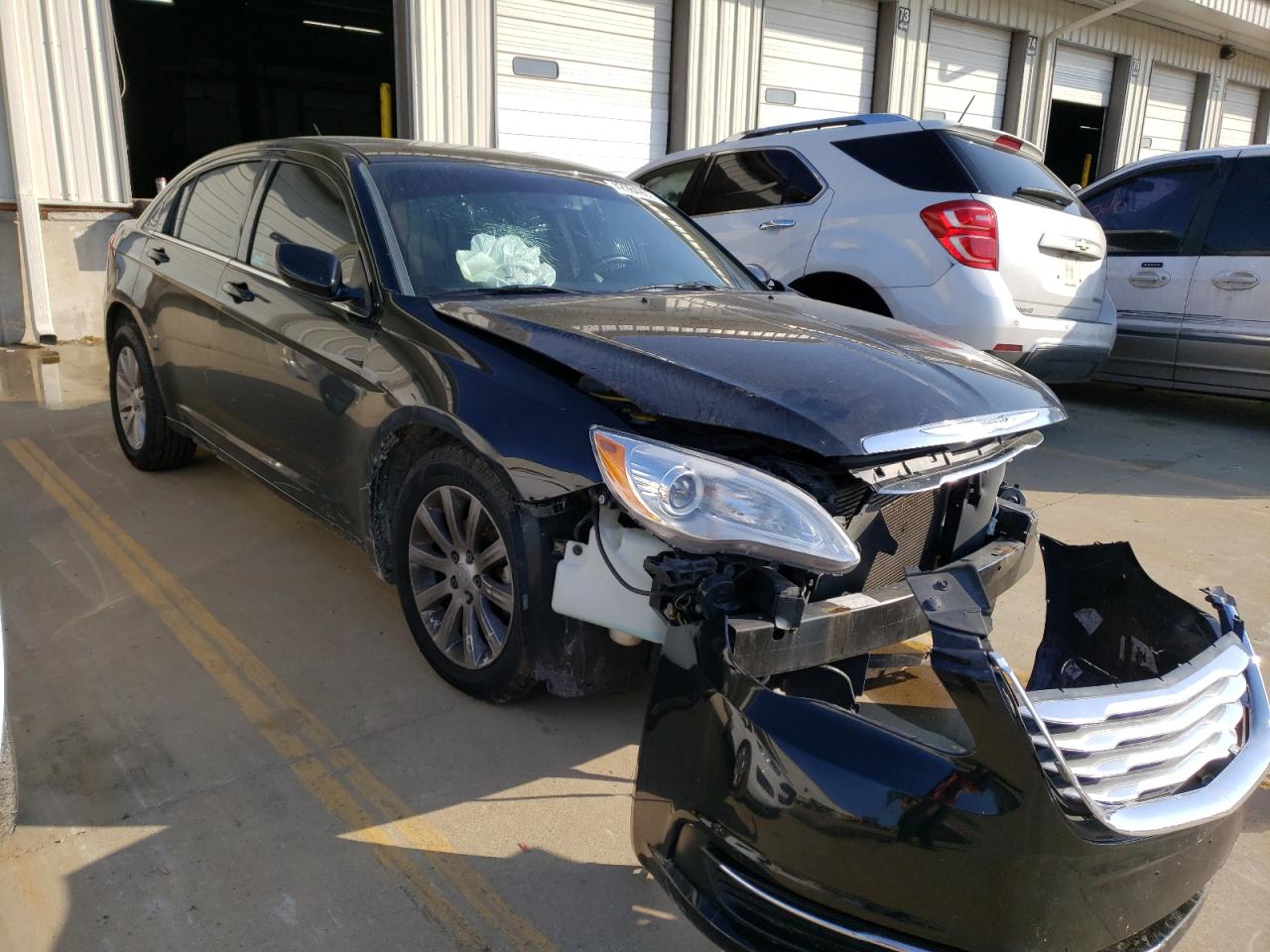CHRYSLER 200 TOURIN 2013 with VIN 1C3CCBBB3DN699863 - Photo from auction