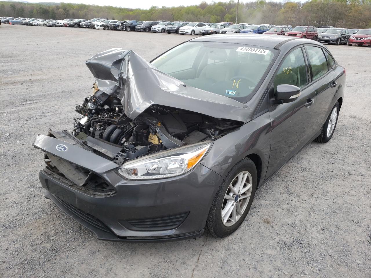 Photo 2 from auction – 2015 FORD FOCUS SE with VIN 1FADP3F2XFL355021