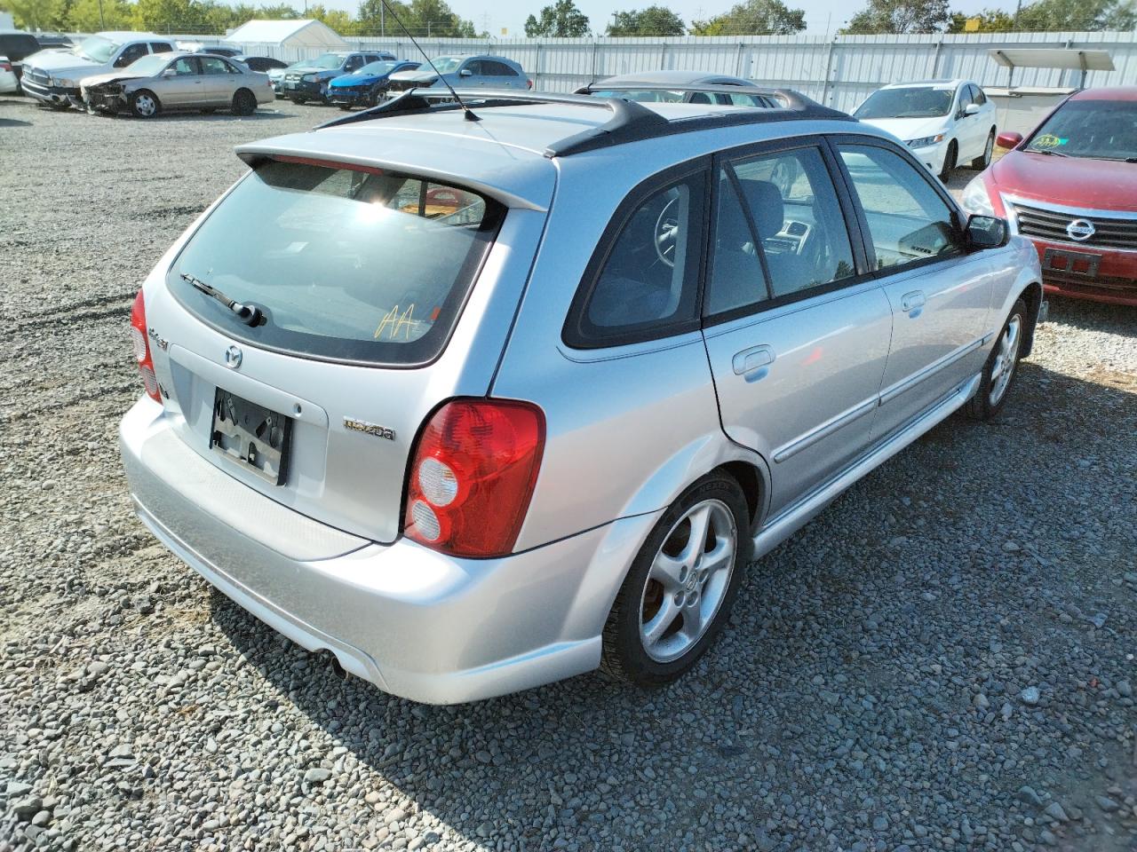 Photo 4 from auction – 2002 MAZDA PROTEGE PR with VIN JM1BJ245121566530