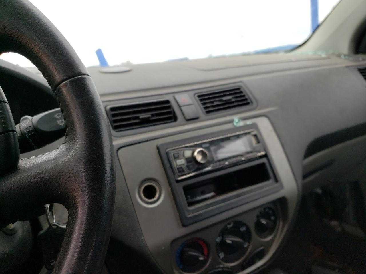 Photo 9 from auction – 2007 FORD FOCUS ZX4 with VIN 1FAHP34N57W348587