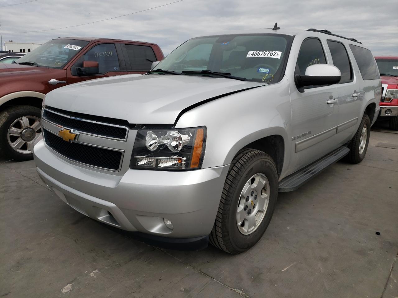 Photo 2 from auction – 2014 CHEVROLET SUBURBAN C with VIN 1GNSCJE07ER133153