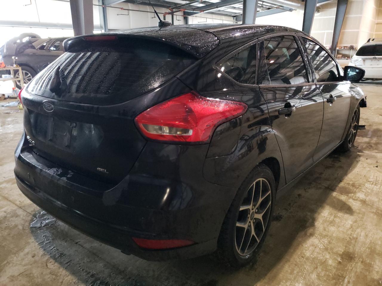 Photo 4 from auction – 2017 FORD FOCUS SEL with VIN 1FADP3M25HL333613
