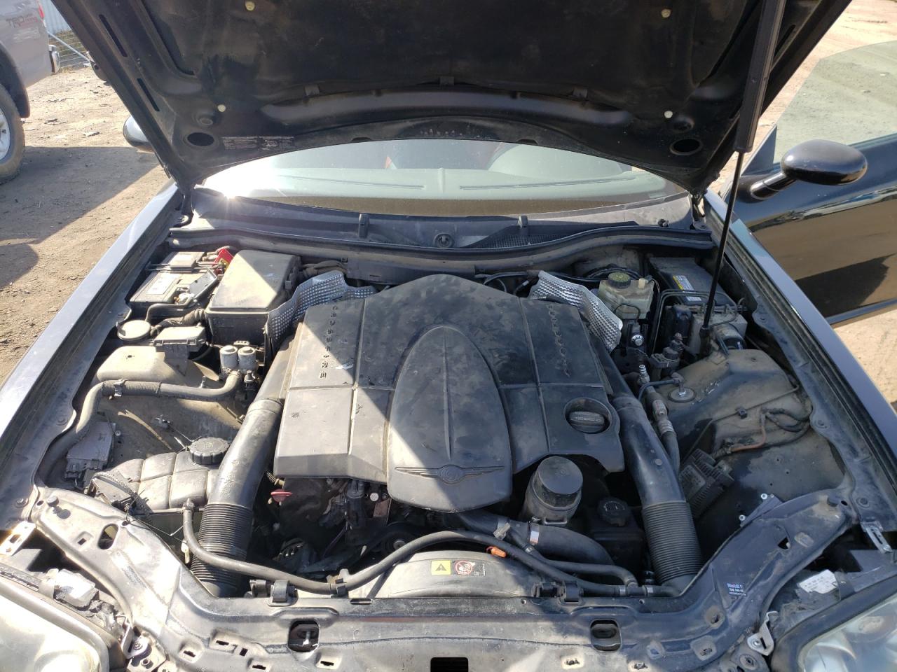 Photo 7 from auction – 2004 CHRYSLER CROSSFIRE with VIN 1C3AN69L54X024446