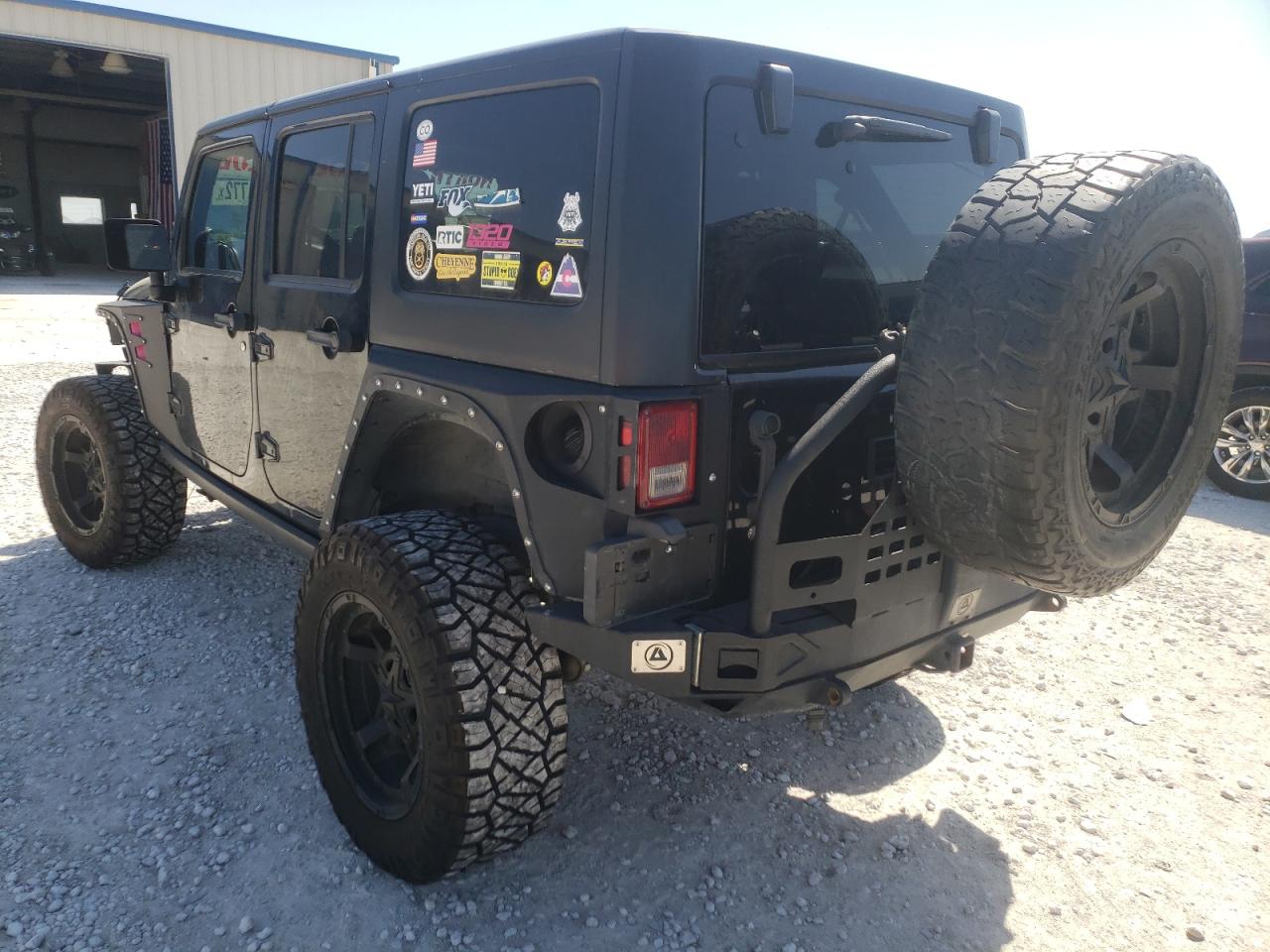 Photo 3 from auction – 2012 JEEP WRANGLER U with VIN 1C4BJWDG6CL163710