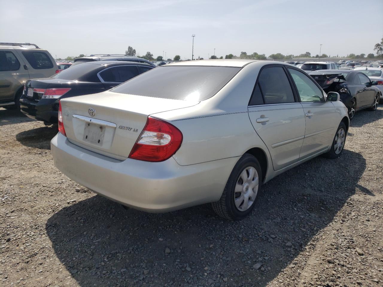 Photo 4 from auction – 2002 TOYOTA CAMRY LE with VIN JTDBE32K520124987