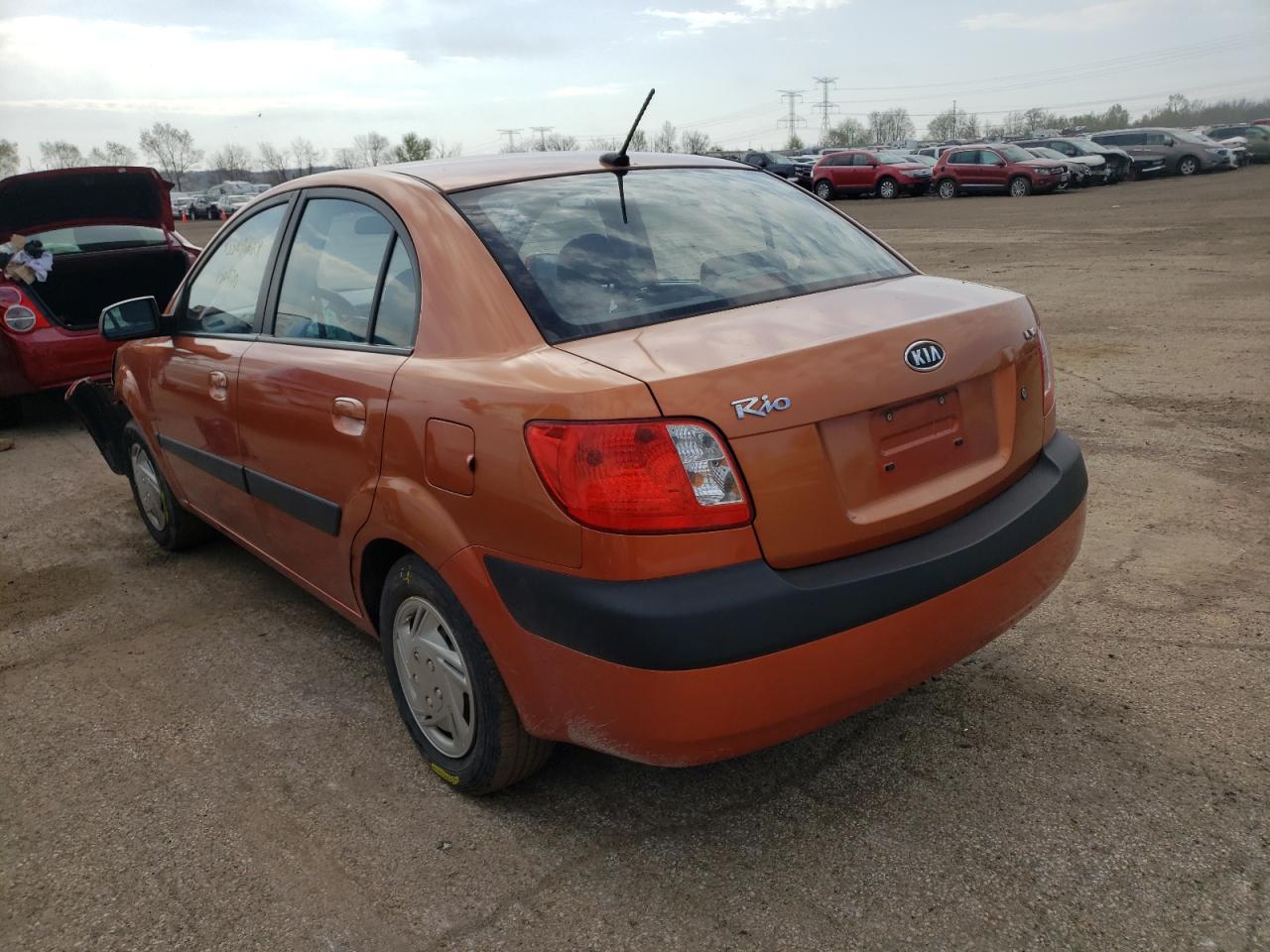 Photo 3 from auction – 2009 KIA RIO BASE with VIN KNADE223X96543868