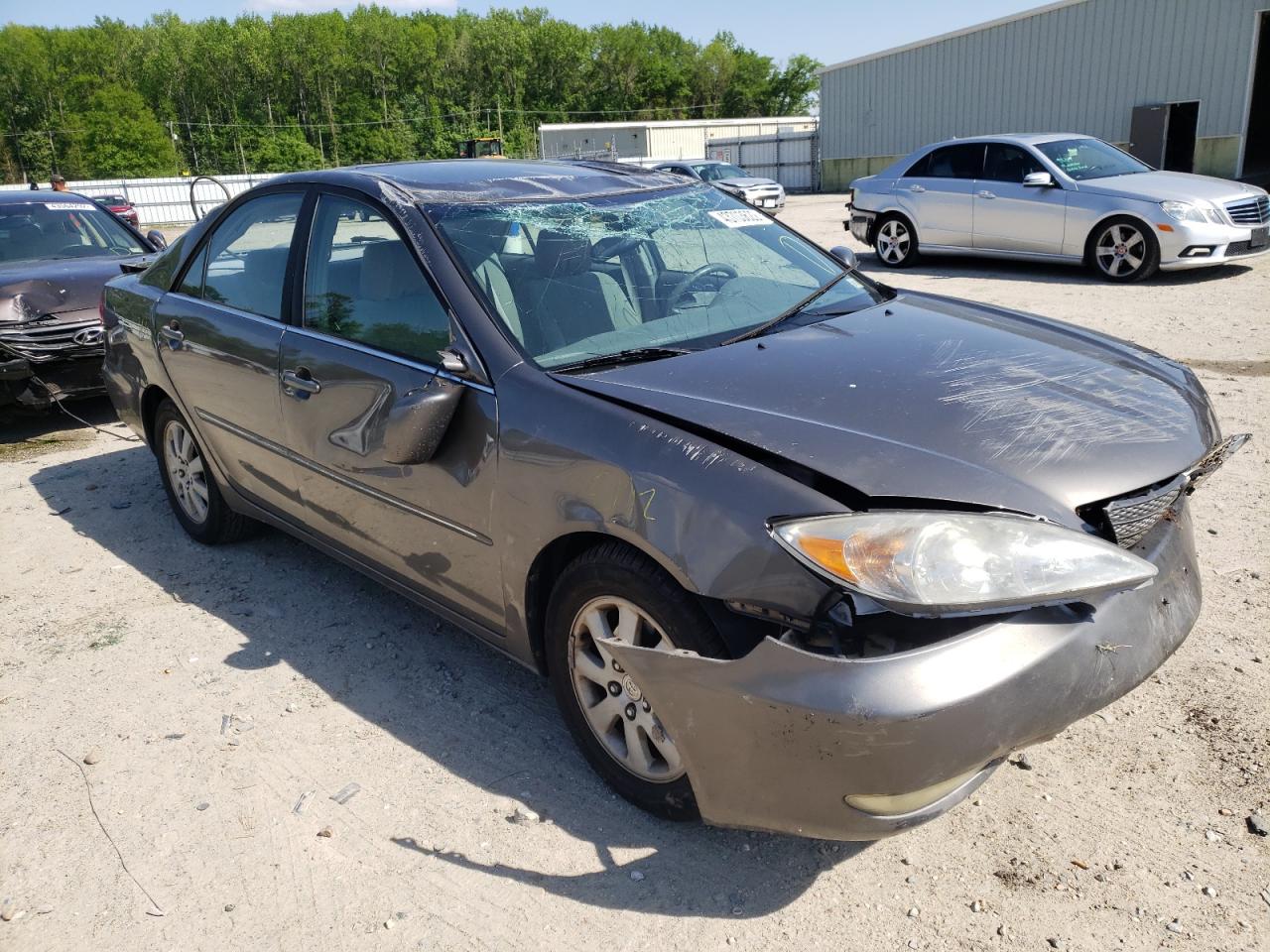 TOYOTA CAMRY LE 2004 with VIN 4T1BF32K94U573464 - Photo from auction