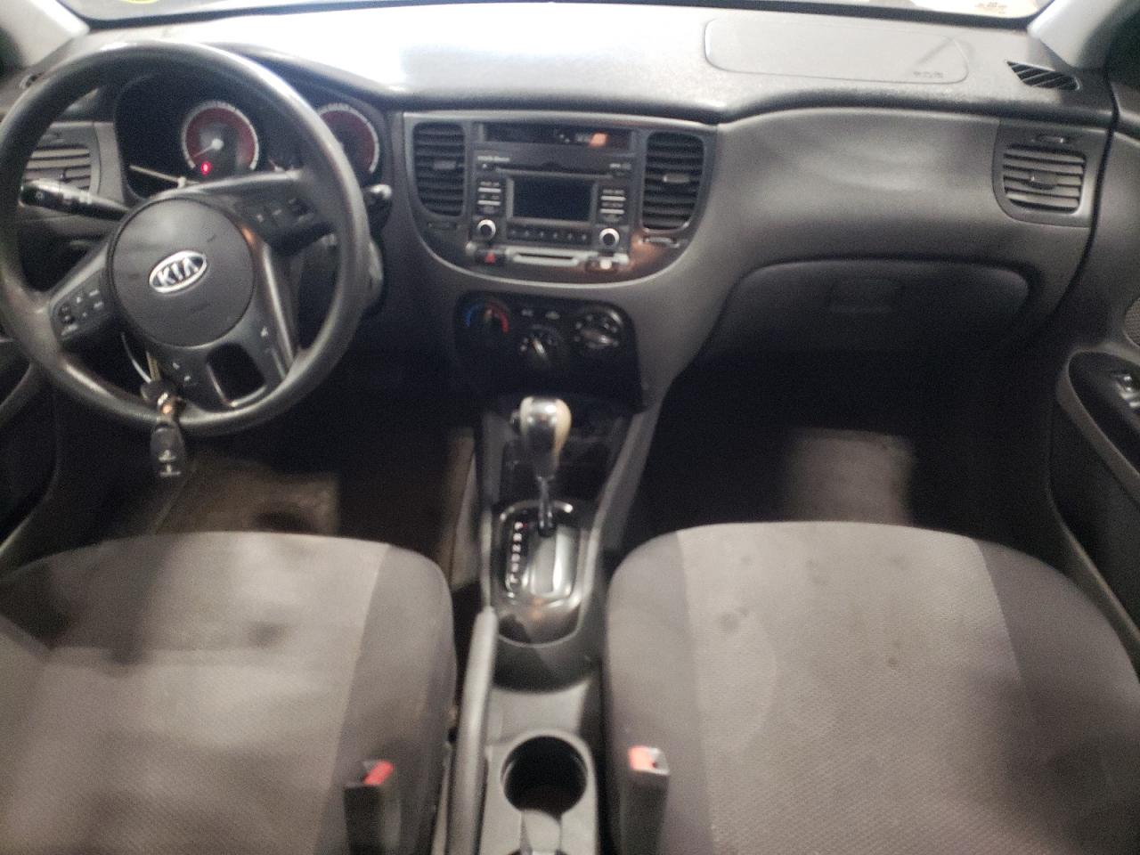 Photo 9 from auction – 2011 KIA RIO BASE with VIN KNADH4A30B6750358